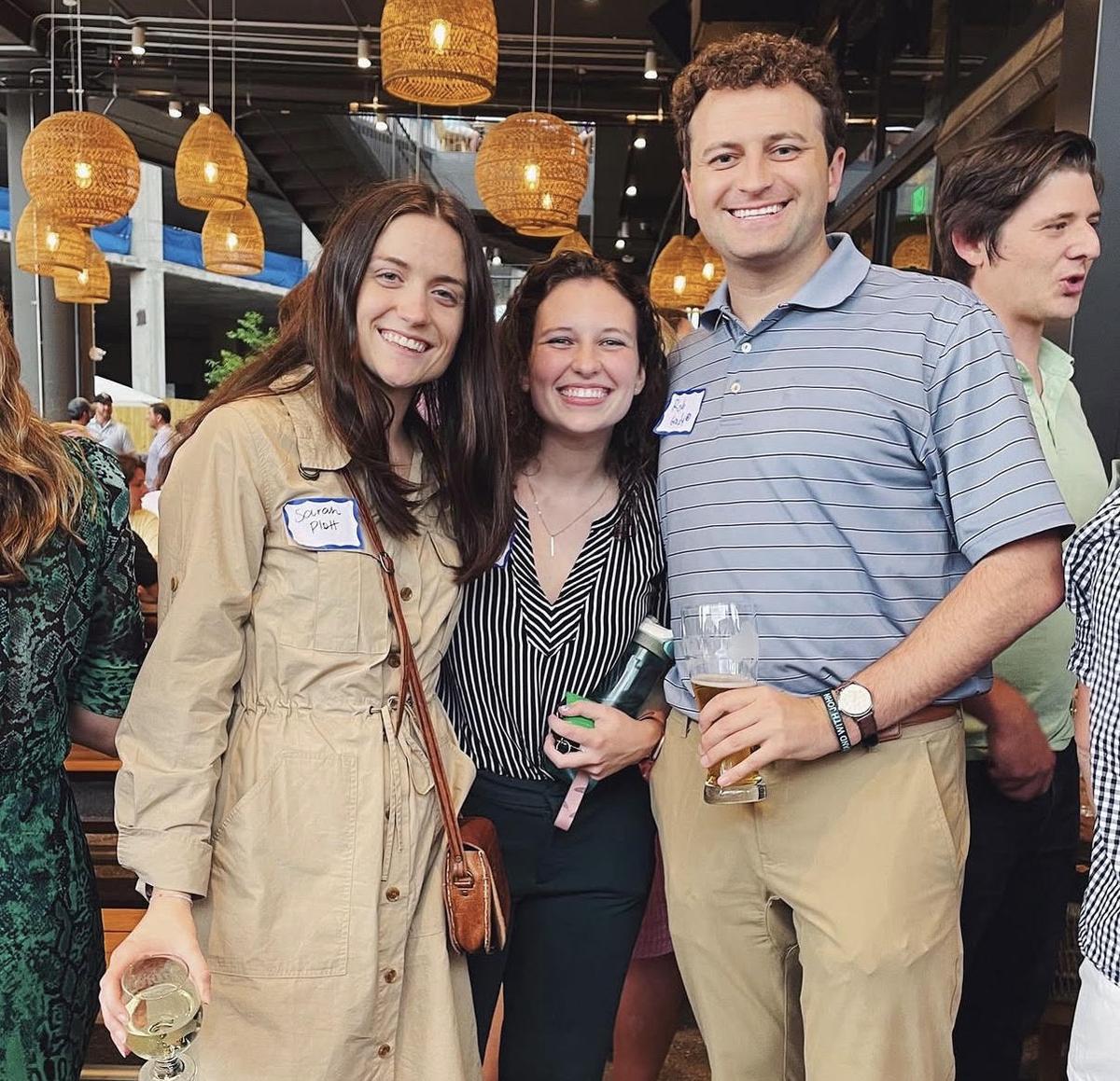 Friends enjoying drinks at a previous Freedom Communities event